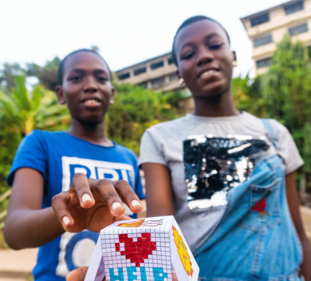 Learners proudly showcasing SDG Pixel Art PSA cube